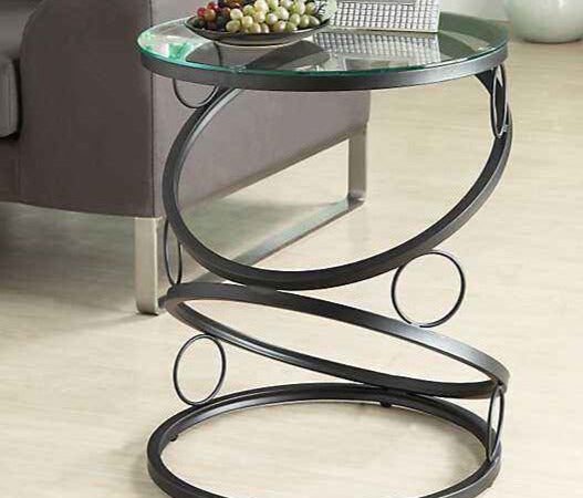 طاولة معدنية بسطح زجاج